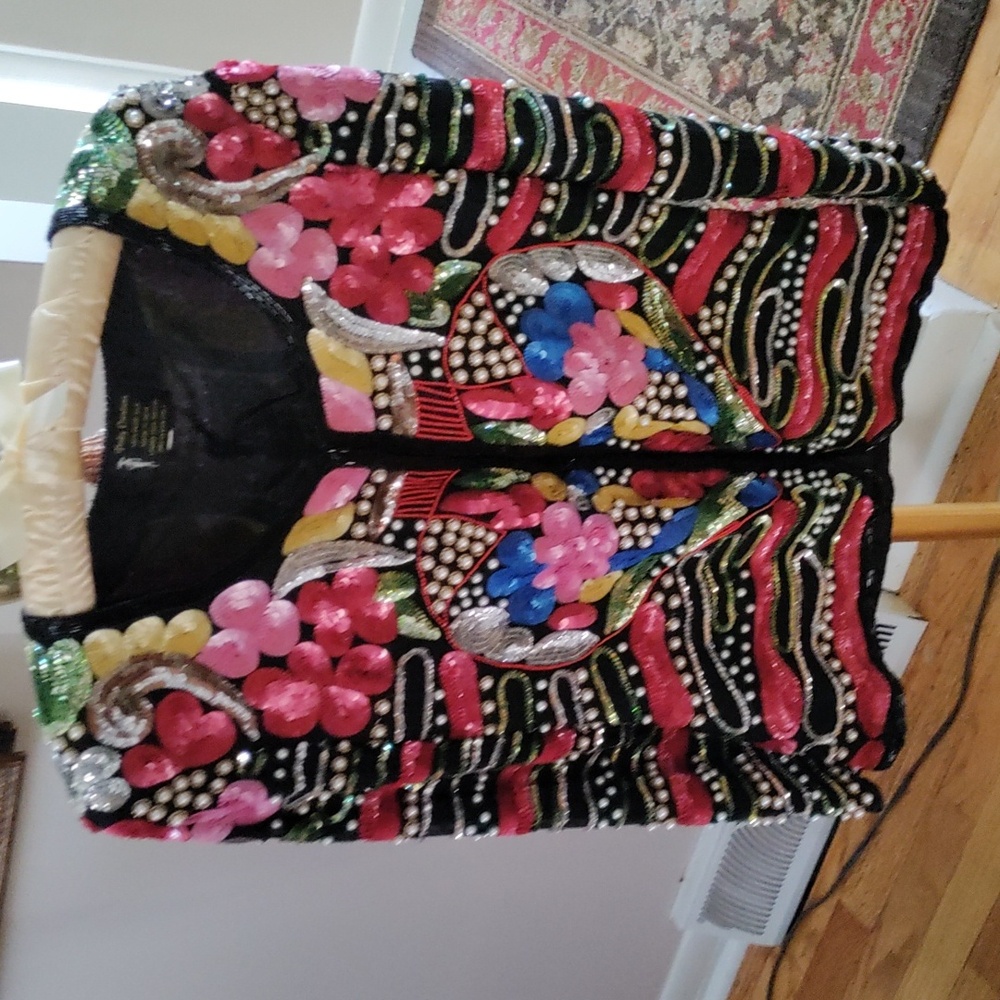 Ladies pinky creation jacket.